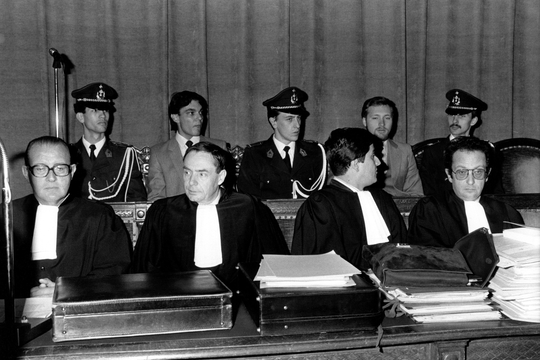 BRUSSELS, BELGIUM (FILE) : This file picture dated 4 May 1987 is about the trial of the Pastorale murders. Two persons, Alphonse Vandermeulen and Francesca Arcoulin, were killed in a synagogue on the street "la Pastorale" at Anderlecht on the 18th of February 1982. Eric Lammers and Marcel Barbier, WNP members (extreme right-wing organization), were suspected as the murderers. On the picture : the defendant with their lawyers. BELGA PHOTO ARCHIVES