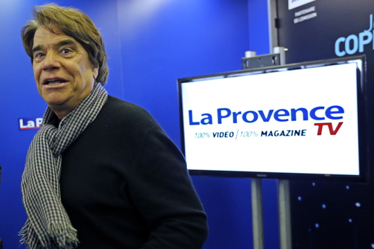 French businessman Tapie attends a news conference for the launching of his web TV at the headquarters of daily newspaper 'La Provence' in Marseille