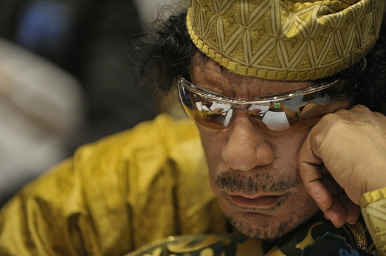 1200px-Muammar_al-Gaddafi,_12th_AU_Summit,_090202-N-0506A-324